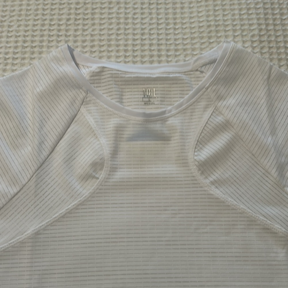 Short sleeve tennis shirt made by Tail